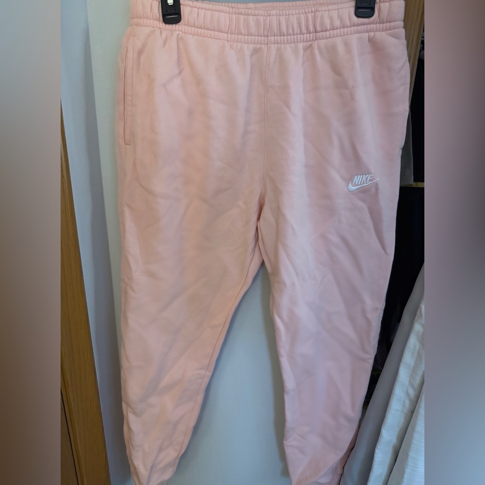 Pink Nike jogger/sweatpants, size medium.
